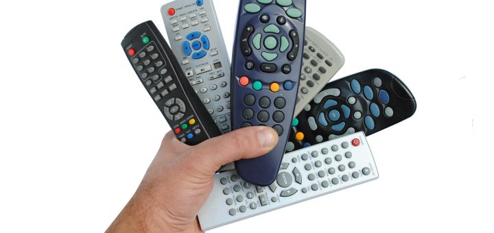 man hand holds six remote control