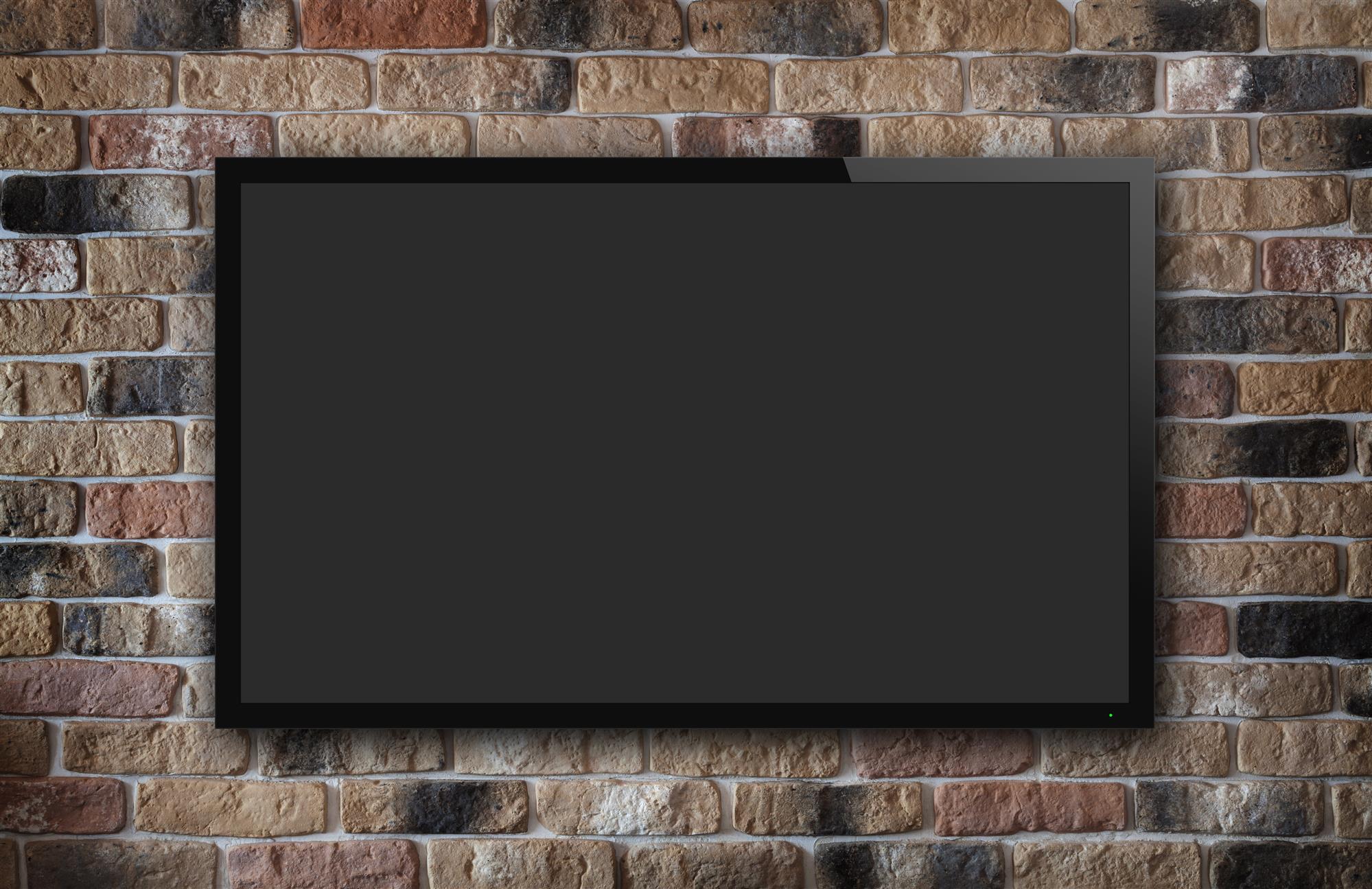 tv display on old brick wall background
