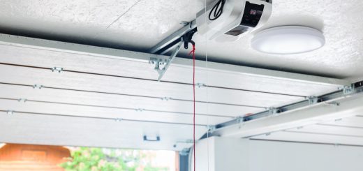 automatic garage door opener electric engine gear mounted on ceiling with emergency cord