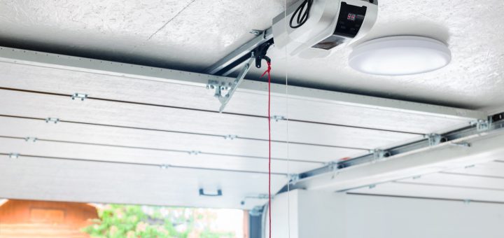 automatic garage door opener electric engine gear mounted on ceiling with emergency cord